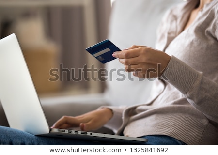 Stock photo: Wallet With Banking Plastic Card And Sitting Woman