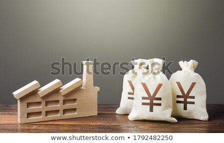 Foto stock: Yen Yuan Money Bags And Industrial Factory Plant Privatization And Purchase Of Industrial Complexes