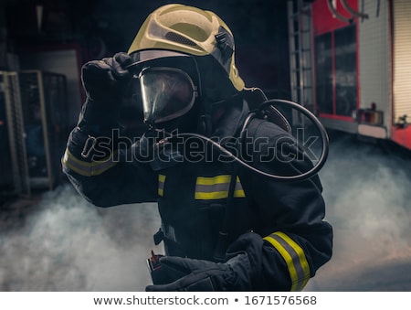Fireman At Work On The Truck Stock photo © Gorgev