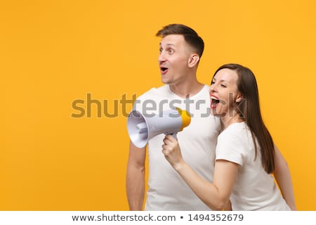 Foto stock: Woman With A Man With A Megaphone