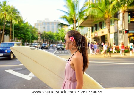 Foto d'archivio: Surfer Girl Surfing Walking With Surfboard Waikiki