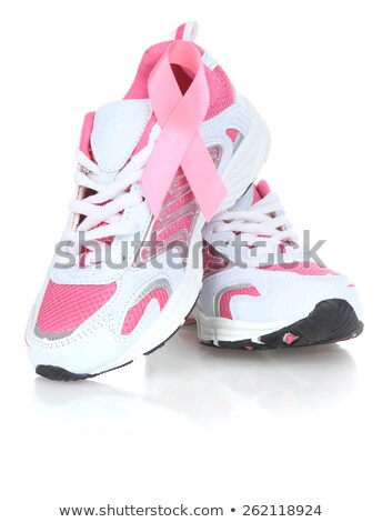 Foto stock: Pink Awareness Ribbon With Shoes