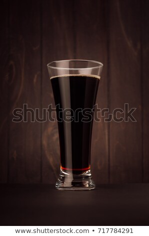 Сток-фото: Weizen Beer Glass Porter Or Red Ale On Dark Wood Board Vertical