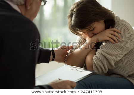 Foto stock: Senior Woman Psychologist And Sad Man Patient