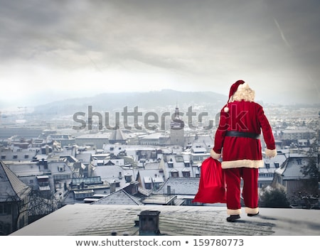 Stok fotoğraf: Santa Claus Walking On Snow