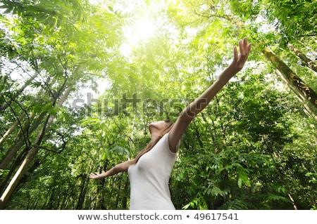 Foto stock: Armed Woman In The Forest