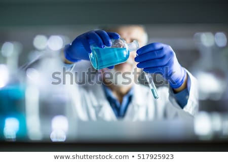 ストックフォト: Scientists Carrying Out An Experiment In A Lab