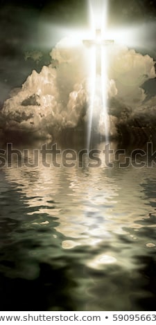 Stockfoto: Christian Cross With Light Beams Over Sky