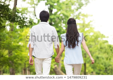 Stok fotoğraf: Married Couple Walking