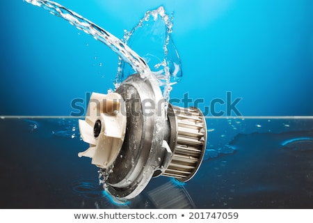 ストックフォト: Auto Parts Engine Cooling Pump In Water Splash On Blue Backgrou