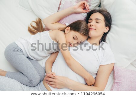 Сток-фото: Cute Pretty Little Girl Lying Resting On Her Bed