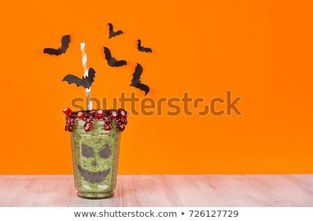 Foto stock: Halloween Food Fun Zombie Smoothie On White Wood Board