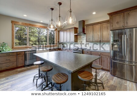 Stockfoto: Open Large Kitchen Interior With Vaulted Ceiling And White Appliances