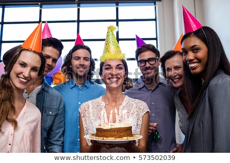 Imagine de stoc: Happy Coworkers With Cake At Office Birthday Party