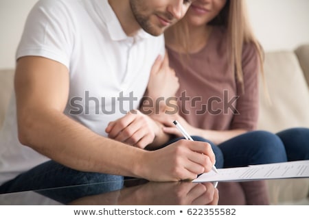 Stock fotó: Closeup Of A Young Smiling Business Man Sitting At His Home Offi