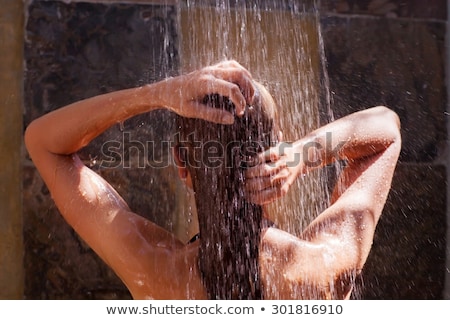 Foto stock: Girl Take Shower Outdoor