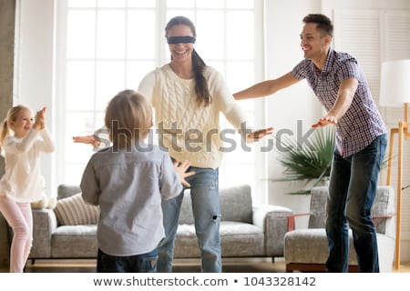 Stockfoto: Woman Playing A Hiding Game