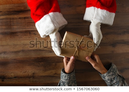 Foto stock: Santa Claus Military Santa In Camouflage Uniforms And Soldier H