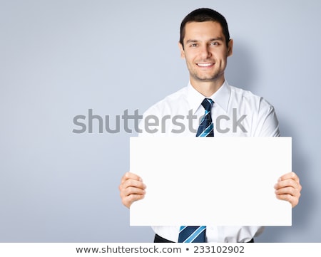 [[stock_photo]]: European Businessman Holding White Board