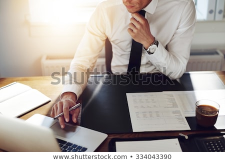 Foto stock: Business Man Works In Office With Laptop Concept Of Internet Network Double Exposure
