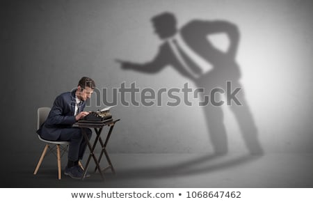 Сток-фото: Man Working Hard And Shadow Arguing With Him