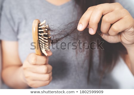 Foto stock: Hair Fall And Comb