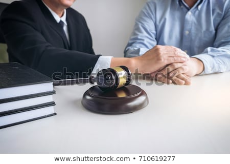 Stok fotoğraf: Image Of Male Lawyer Or Judge Help Encourage Client Customer W
