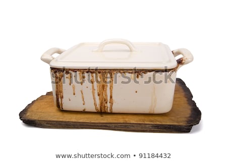 Dirty Ceramic Pot For Stove On Old Kitchen Board Stockfoto © Lizard