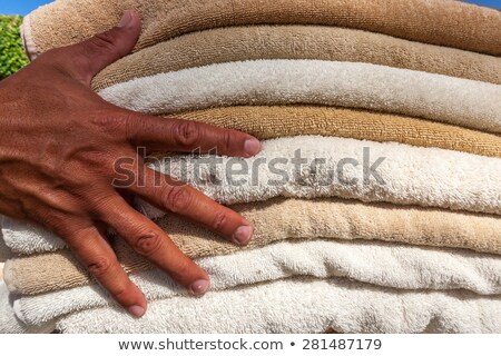 Stok fotoğraf: Stack Of White And Broun Plush Hotel Towels