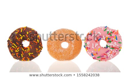 ストックフォト: Donuts On Reflection Table