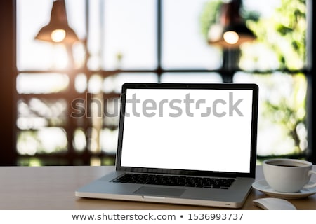 Stockfoto: Favorite Website On Laptop In Modern Workplace Background