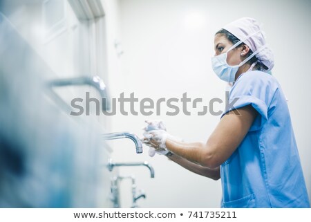 Foto d'archivio: Surgeon Washing Hands Before Operation