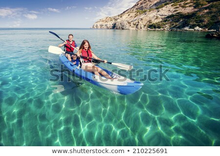 Stok fotoğraf: Two Kayaks On Beach