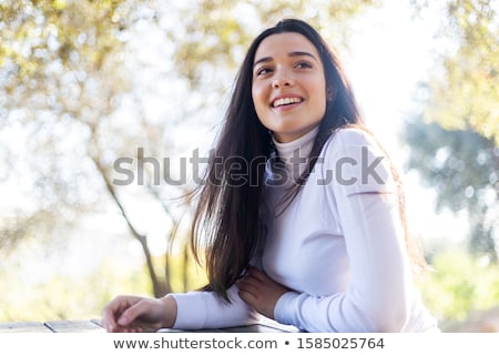 Stockfoto: Low Angle Portrait Of Young Woman