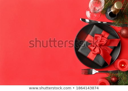 Stok fotoğraf: Christmas Table Setting With Champagne And Xmas Gift