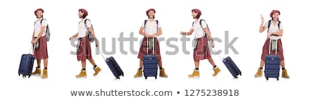 Foto stock: Man In Scottish Skirt With Suitcase Isolated On White