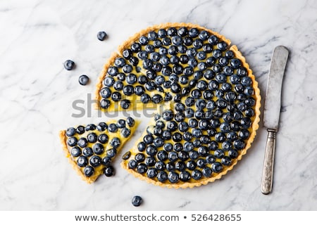 Foto stock: Blueberry Tart With Vanilla Custard On A Marble Board