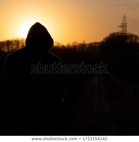 Stockfoto: Man In Orange Sweat Hood