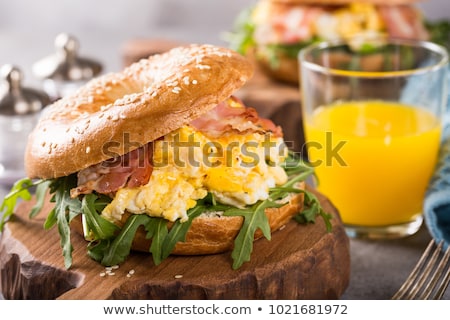 Zdjęcia stock: Freshly Baked Bagel Filled With Scrambled Eggs