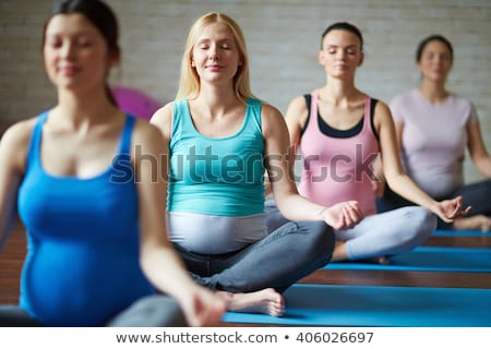 [[stock_photo]]: Woman Doing Prenatal Yoga Exercise
