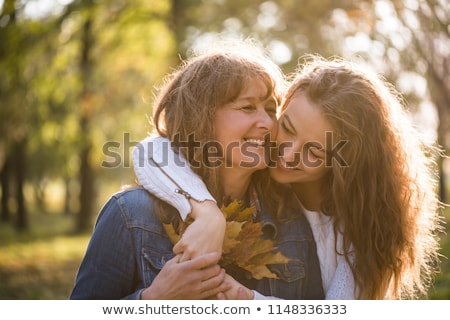 Stock photo: Mother With Daughter In Autumn Park