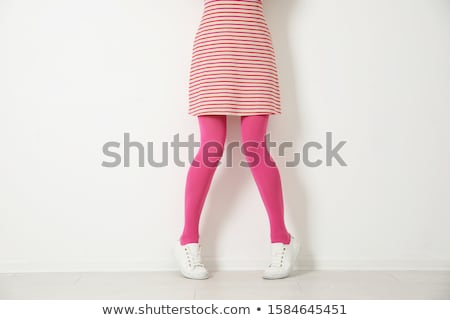 Stok fotoğraf: Female Legs On Pink Background