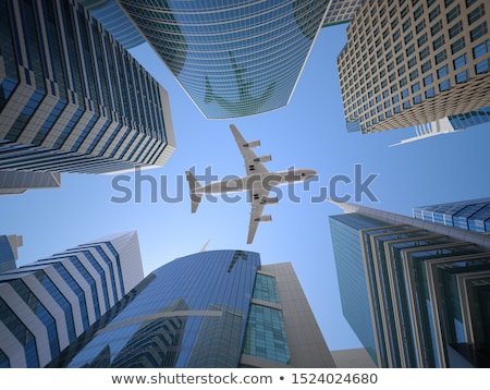 Сток-фото: Plane Over The City