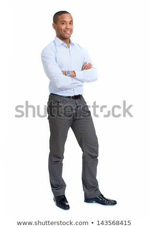 Foto stock: Portrait Of African Businessman With Arms Folded Over White Background