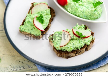 Canape With Cottage Cheese Greens And A Garden Radish Foto d'archivio © zoryanchik