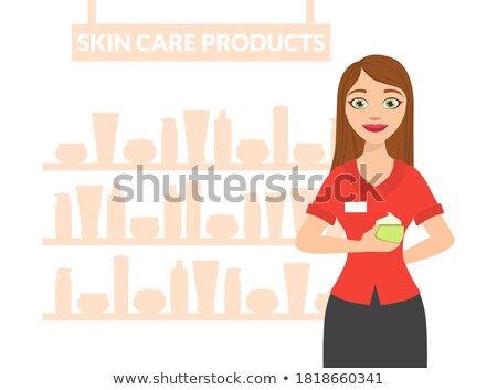 Stok fotoğraf: Cosmetic Seller Offering Face Cream In Beauty Shop