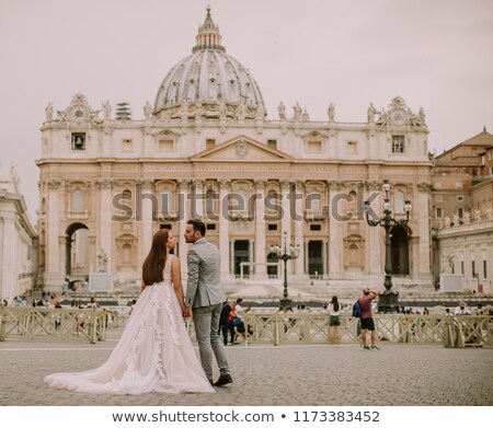 Stock photo: Young Wedding Couple By Saint Peter Cathedral In Vatican
