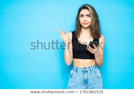 Stock photo: Portrait Of A Frustrated Young Girl In Dress