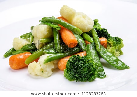 Foto stock: Fresh Green Organic Broccoli In White Bowl