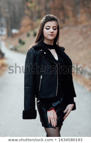 Stock photo: Outdoor Portrait Of Young Beautiful Happy Smiling Lady Posing Near Flowering Tree Model Wearing Sty